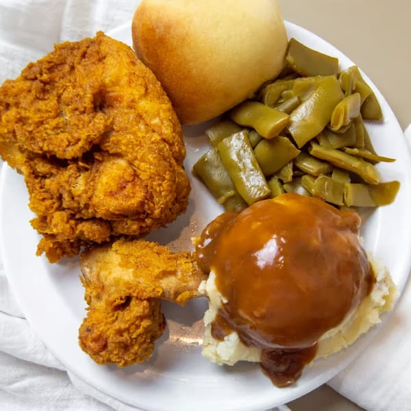 Granny Cantrell's southern fried chicken, mashed potatoes with gravy, green beans, and a roll.